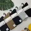 Calcetines de cachemir de doble puntada para hombre y mujer de invierno, calcetines de tubo de moda para mujer con rayas marrones y encaje, calcetines de algodón de cachemir hipoalergénicos para hombre de negocios