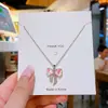 Nueva cadena de clavícula de lujo estilo coreano, collar versátil de acero de titanio de moda para mujer, colgante simple clásico de circón, accesorio versátil