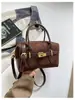 Bolso de mano Boston de gamuza vintage transfronterizo para mujer, nuevo bolso nicho de alta moda tipo almohada, bolso de hombro y bandolera