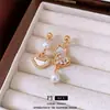 Aretes Asimétricos de Calabaza con Circonita Bañados en Oro Real, Nuevos Aretes de Botón de Moda y Elegantes Estilo Chino con un Diseño Único para Mujer