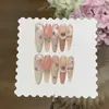 Um par de Unhas Postiças Gu [Menina Doce de Frutas Doces] estilo francês, feitas à mão, com estampa xadrez rosa acetinado, estilo olho de gato, cravejadas de estrelas
