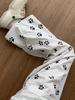 Calça Branca Estampa de Patinha de Cachorro Fofa Feminina Verão Fina 2025 Novo Estilo Pequeno Masculino Solta Reta Casual Calça de Perna Larga