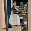 Nueva Falda Casual de Estilo Coreano Miu-Style de Cintura Alta Línea A para Mujer Primavera y Verano 2026 Plisada Versátil Blanca de Media Longitud