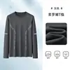 Temporada de primavera y otoño, camiseta lisa popular de manga larga, corte holgado, cuello redondo, unisex, top simple y versátil