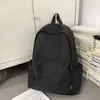 Mochila Sencilla de Color Sólido para Estudiantes Universitarios Hombres y Mujeres Mochila Ligera para Exteriores y Viajes Estilo Minimalista Versátil para el Día a Día Mochila de Doble Hombro Moderna
