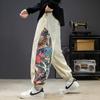 Comercio exterior otoño e invierno 2021 Nuevo estilo chino para hombre pantalones casuales retro estampado lateral pantalones de punta moda al por mayor