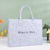 Bolso de fieltro con letras al por mayor, bolso de mano de fieltro de un solo hombro, bolso de mano de gran capacidad para uso diario, bolso de regalo publicitario.