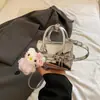 Bolsa Quadrada Pequena de Moda de Nicho para Mulheres 2026 Nova Coleção Primavera/Verão Elegante Bolsa de Ombro Transversal para o Dia a Dia Casual Simples