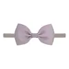 305 Accesorios para el cabello para bebés europeos y americanos de AliExpress, banda para el cabello con lazo de color liso simple para niños, diadema de nailon sin costuras para bebés.