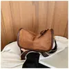 Bolso vintage de gamuza transfronterizo para mujer, nuevo modelo 2026, bolso de hombro y cruzado de nicho de lujo ligero, bolso casual tipo almohada para el trabajo