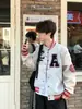 Nueva chaqueta de béisbol bordada con letras estilo americano retro chino para hombres y mujeres, chaqueta versátil de corte holgado para la primavera de 2026