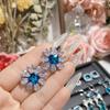 Brincos de flor de safira suíça de luxo novo e brilhante de camélia, banhados a ouro 18K, joias de design de alta qualidade para mulheres