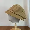 Sombrero de cubo redondo versátil de estilo coreano plisado para otoño e invierno, artístico, vintage, con bordes enrollados, sombrero de pescador de lana de nicho para mujer