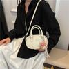 Bolso pequeño de bolos con textura de alta gama para mujer, nuevo bolso bandolera cuadrado pequeño de estilo occidental combinable con todo, bolso de hombro 2025
