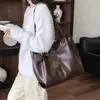 Bolsa Tote Retro de Gran Capacidad para el Viaje Diario de Mujer 2026 Otoño Nuevo Alta Apariencia Elegante Informal Estilo Coreano Bolso de Hombro Único