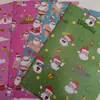 Fabricante en Stock al por Mayor Nuevo Papel Recubierto Brillante de Navidad Divertido e Interesante Papel de Regalo de Papá Noel