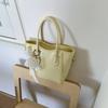 Bolsa Carteiro Coreana de Design de Nicho Fashionável para Mulheres 2025 Verão Novo Estilo Simples e Versátil Bolsa Balde Transversal