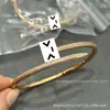 Pulsera de uñas V dorada de alta gama, diseño clásico elástico grueso y delgado, unisex, chapada gruesa en oro rosa de 18 quilates, pulsera de lujo ligero para parejas, al por mayor