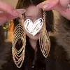 Brincos de Ouro com Rombos em Camadas para Mulheres 2026 Novo Estilo Brincos de Luxo Leve High-End Brincos Longos Elegantes com Franjas