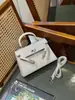 Bolsa Kelly com Couro de Crocodilo 2026 Novo Estilo Fashionável Luxo Leve Toque de Alto Padrão Bolsa de Mão Versátil para o Dia a Dia Ombro Único Transversal Tendência