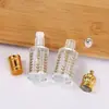 Venta al por mayor de fábrica Botella de Aceite Esencial Galvanizado Vidrio Octogonal Transparente Botella Roll-on Estilo de Oriente Medio Botella Roll-on para Masaje de Ojos En Stock