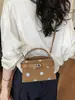 Bolso versátil de moda transfronterizo 2026 verano nuevo nicho bolsa cuadrada pequeña bolso de hombro con un toque de alta gama bolso cruzado