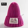 Moda coreana gorro de lana de punto de vuelta de moda coreano para hombres y mujeres gorro puntiagudo dibujado etiqueta de tela para adultos
