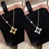 Estilo Explosión de Tela Libro Rojo Collar de Flor de Cuatro Hojas para Mujer 2024 Nuevo Industria Pesada Hueco Microincrustado Cadena para Clavícula de Flor de Cuatro Hojas