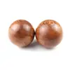 Balón de Balonmano de Madera de Sándalo Se Puede Jugar con Balonmano Fitness. la superficie es lisa y translúcida. Hay dos tamaños disponibles para venta al por mayor de fábrica