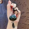 Cartoon big-eyed cabeça de gato boneca bonito chaveiro saco de carro pingente chaveiro criativo pequenos presentes por atacado