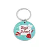 Llaveros personalizados más vendidos transfronterizos, dijes para mochilas, colgantes de aleación para la temporada de graduación, accesorios con temática de campus para las mochilas de los estudiantes