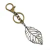 Pluma de Aleación de Bronce Antiguo Creativa Sierra de Pluma Colgante de Pluma Decoración Llavero de Coche Transfronterizo de Moda Popular