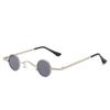 Gafas de sol retro de hip-hop con montura redonda súper pequeña para hombres y mujeres, montura en el mismo estilo de celebridades de Internet, gafas de sol distintivas de metal con montura redonda pequeña.