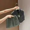 Camisa a cuadros elegante de calidad premium para niños, nuevo estilo 2026, camiseta sin mangas de verano estilo coreano para niños