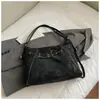 Bolso Tote Casual y Sencillo para Viajeros para Mujer 2025 Invierno Nuevo Textura de Alta Calidad y Versátil Bolso de Hombro Único Sobaco