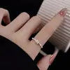 Anillo de flor de trébol de cuatro hojas de diamante flash para mujer, diseño de nicho de lujo ligero, estilo de moda Ins, anillo de apertura exquisito, venta al por mayor