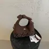 Bolsa de Mão Xadrez com Laço em Camurça Estilo Coreano Versão Coreana Feminina Bolsa Meia-Lua de Nicho Bolsa de Ombro Transversal