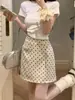 Saia Retro de Bolinhas para Mulheres 2026 Novo Verão Cintura Alta Justa Elegante Versátil Mais Vendida Evasê Justa no Quadril Curta
