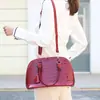 Bolso de Hombro con Forma de Concha Transfronterizo 2025 Nueva Moda Patrón de Cocodrilo PU Brillante Estilo Europeo y Americano Bolso de Mano Dropshipping