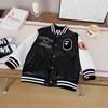 Chaqueta de béisbol Patchwork de PU para niños de Qingdao, estilo nuevo, con bordado pesado y chaqueta de cuero estampada para primavera e invierno