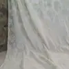 Tela Jacquard con Textura Floral en Relieve Oscuro Transparente Estéreo para Vestido de Moda Ropa de Primavera y Verano Ligera y Ligeramente Transparente