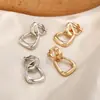 Nuevos pendientes geométricos de metal lisos simples combinables sin agujero en la oreja clip para oreja estilo frío europeo y americano venta caliente transfronteriza