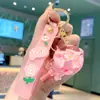Llavero Colgante de Botella de Arena Movediza, Llavero Exquisito para Mujer, Accesorio de Cristal de Flor Pequeña para Niñas, Linda Decoración para Mochila