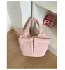 Bolso de Mano Casual Simple para Mujer 2026 Nuevo Bolso Cesta de Nylon de Color Sólido Bolso Cubo Versátil