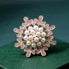 Versión coreana de broche de perla de diamante de alta calidad, moda, hebilla de mariposa anti-luz para bufanda, pasador fino de alta calidad, venta al por mayor de ropa