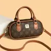 Bolso de mano estilo retro, con forma de almohada, para mujer, nueva colección 2026, moderno y versátil, bolso de hombro o bolso cruzado, con diseño de estampado de alta gama, bolso cuadrado pequeño