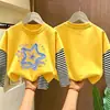 Camiseta de manga larga a rayas de algodón puro para niñas, estilo primavera/otoño, nueva colección 2026, moderna y elegante, diseñada para niñas de talla mediana a grande, con un look en capas