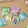 Bolsa con cierre tipo ziplock de cara sonriente de dibujos animados, bolsa de embalaje transparente con interior aluminizado impreso, bolsa sellada anti-oxidación para joyería, bolsa de almacenamiento