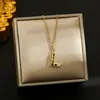 Collar transfronterizo de acero de titanio para mujer con incrustaciones de circonita de color geométrico 26 letras inglesas cadena de clavícula de lujo joyería no se decolora