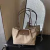 Bolsa de Camurça Outono e Inverno Feminina Grande Capacidade 2025 Nova Bolsa Casual de Ombro Axila Outono e Inverno Bolsa Retrô